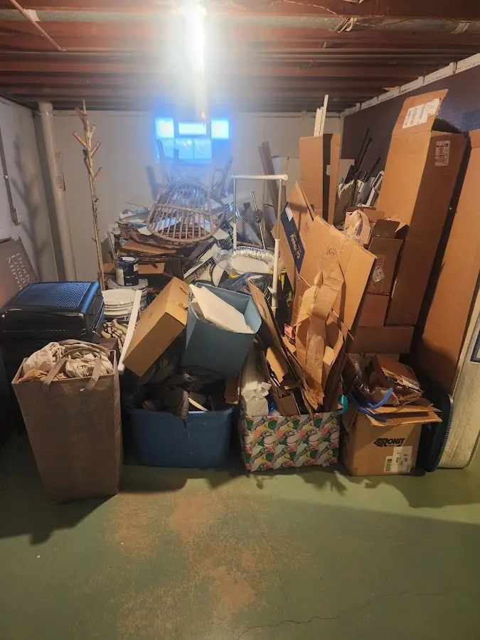 Roll-off dumpster container at job site for 2 Yard Dumpster Rental in Royalton